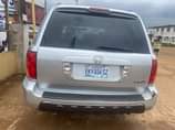 A picture of Honda pilot three rolls LESS THAN A YEAR REGISTERED