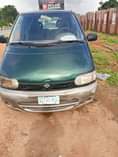 A picture of Nissan Serena bus first body first paint with untampered engine