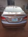 A picture of 2014 model accent bought brand new everything intact Price 2m