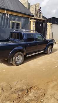 A picture of Give me 2 5m and take it Nissan pick up