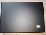 A picture of HP laptop with Original New battery and charger