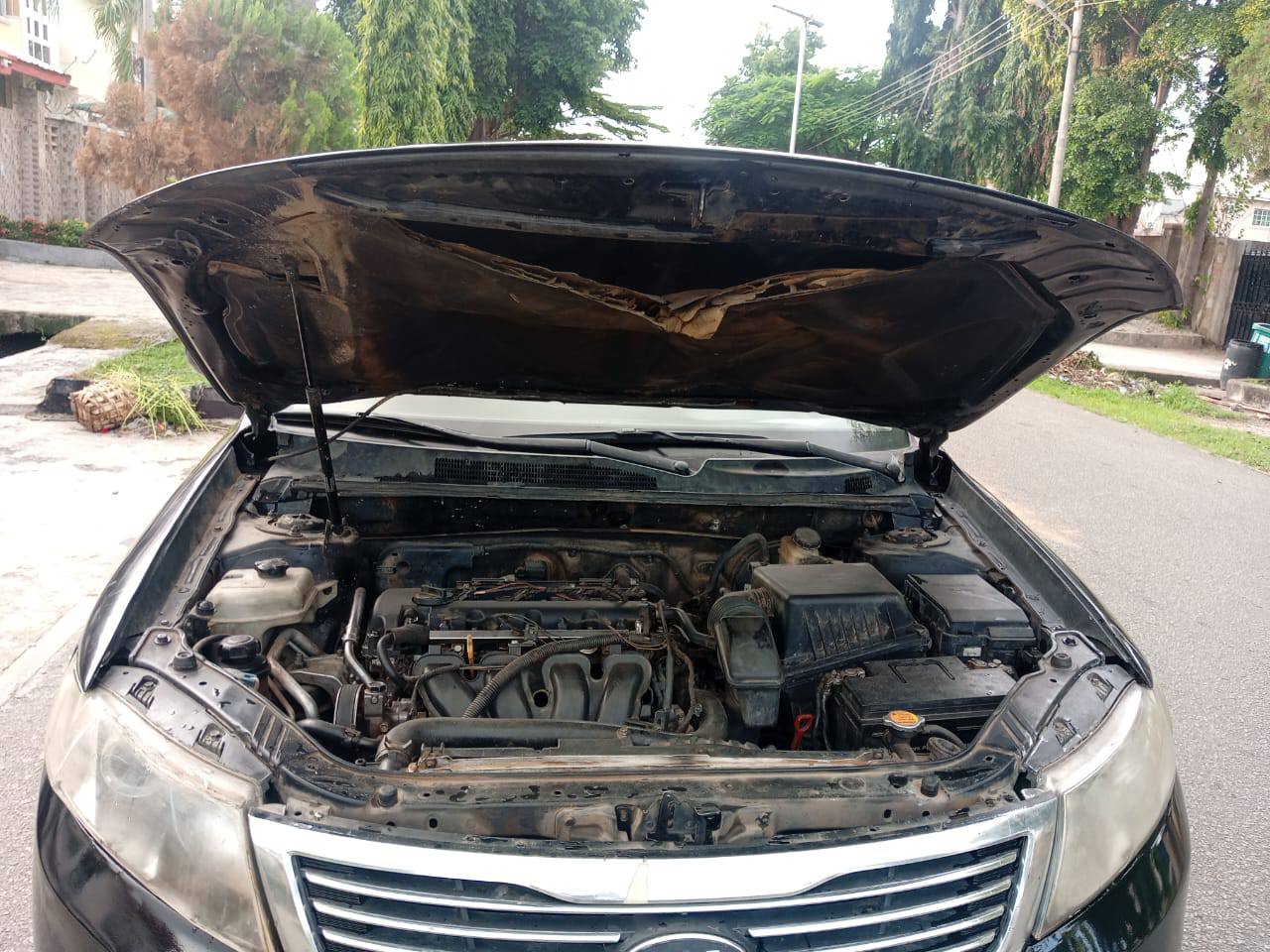 A picture of  Super distress 2010 Kia optima with sound engine automatic
