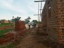 A picture of Kasangati nalusuga site Plot size 100by50ft 21m Plot size 70by50ft