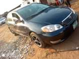 A picture of Good grade black Corolla Ac intact Gear intact Engine intact