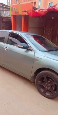 A picture of Distress sale Extra neat Hybrid Toyota Camry 2009 model everything