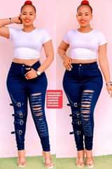 A picture of Jeans and dresses available at la epic boutique Wandegeya WhatsApp