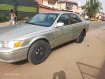 A picture of Very sharp silver color 2002 Toyota Camry droplite Engine gear