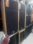 A picture of Piano drumsets keyboards speakers and microphones..