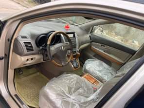 A picture of This is astonishing clean lexus rx330 2005 model few months