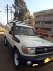 A picture of RAND CRUISER HAD TOP NZURI SANA NO KIPENGERE COIL MACHO