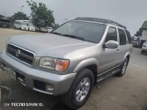 A picture of Highest grade old model Nissan Pathfinder everything is intact and