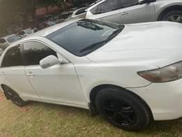 A picture of Distress Sale Extremely Clean Registered 08 Toyota Camry 4 plugs