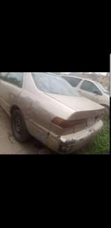 A picture of Toyota Camry tiny light Engine and gear are working perfectly