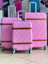 A picture of Genuine suitcases on sale
