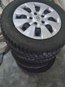 A picture of New tyre with rim wheelcape size 15