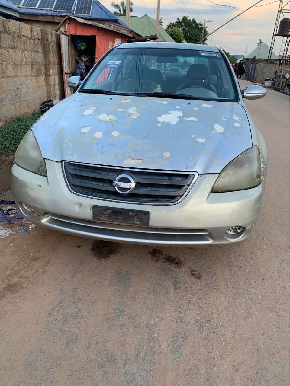 A picture of Faded body Nissan Altima 2004 Very sharp On distress 07014406402