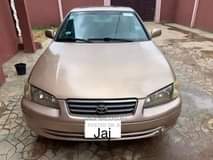 A picture of 2002 Toyota Camry 2002 Gold in idimu Toyota Camry 2002