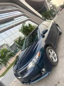 A picture of Very clean well maintained 2013 Toyota Camry Sport. Toks standard.