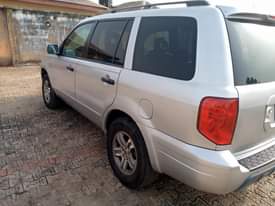 A picture of SHARP CLEAN HONDA PILOT 2004 UNTOUCHED ENGINE AND GEAR PERFECT