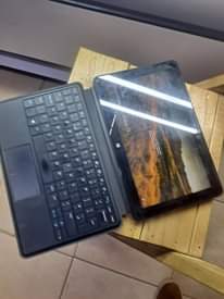 A picture of Dell with 4gb and 128gb Ssd Touch screen and Detachable