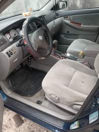 A picture of Toyota Corolla 2004 model sound engine gear and air condition