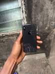 A picture of Iphone x 256gb no face id and color line on