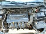 A picture of 2004 Distress Toyota Corolla LE