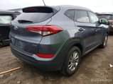 A picture of Hyundai Tucson Limited 2017 Gray 2.0L 4 vin KM8J3CA40HU302239