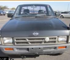 A picture of 1994 Nissan pickup is available for sale location based in