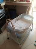 A picture of Baby bed with mattressand a mosquito net