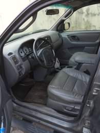 A picture of Ford escape xlt First body Engine good Gear selective Interior