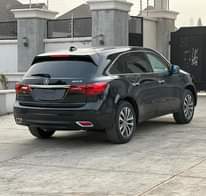 A picture of FOREIGN USED 2015 ACURA M D X WITH DUTY PRICE
