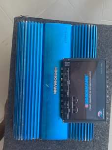 A picture of kicker subwoofer speaker 255752300033 boschman amplifier boschman equalizer