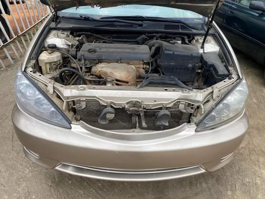 A picture of 2005 Nigeria used Toyota Camry Gold color 4Plug Buy and