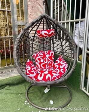 A picture of PREMIUM INDOOR AND OUTDOOR RELAXATION. RECREATIONAL RATTANS SWIND CHAIR for