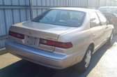 A picture of 1998 Toyota Camry LE Gold factory AC first body sound