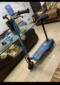 A picture of RECHARGEABLE ELECTRIC SCOOTER BATTERY IS BAD CHARGER IS BURNT 100K