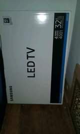 A picture of 450 000 last price for 32inch flat screen TV brand