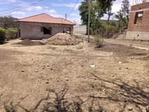 A picture of Kiwanja kimenyooka kinauzwa barabara ya east africa road