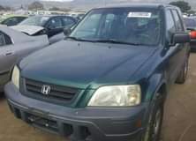 A picture of Super Clean 2000 HONDA CR V LX GREEN For Just