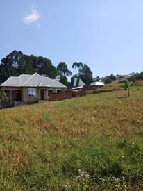 A picture of KIWANJA HATUA 100 KWA 50 TUNAGAWA NA KUUZA NJOO NA