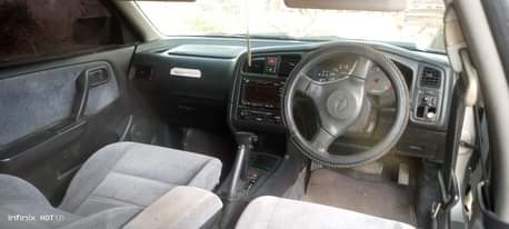 A picture of Kimfaacho mtu chake Nissan Premera inauzwa Tsh 1 500 000