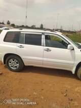 A picture of 2003 Toyota Highlander with smoking engine