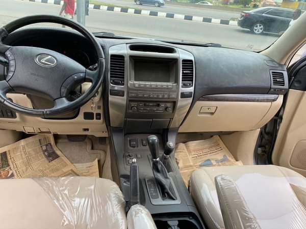 A picture of FOREIGN USED 2005 GX470 LEXUS WITH ORIGINAL CUSTOM PAPERS AT