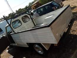 A picture of POUGEOT PICKUP AVAILABLE FOR SALE PRICE 400 000 CONTACT 09061893712