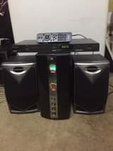 A picture of AIRIS HOME THEATRE SYSTEM AND PHILIPS DVD.
