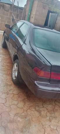 A picture of 2002 Toyota Camry droplight Painting on first body