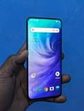 A picture of ONEPLUS 7 PRO 5G with a slight back crack