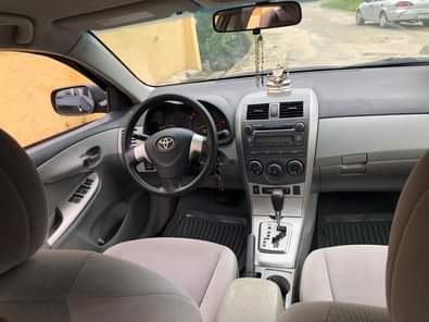 A picture of NEATLY USED 20 13 MODEL TOYOTA COROLLA Absolutely nothing to