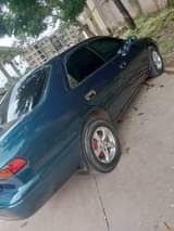 A picture of Clean and neat tiny light Camry going for 1 3m